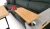 sofa-w-ksztalcie-litery-l-pojemnik-na-posciel-funkcja-relax-dwie-pufy.webp